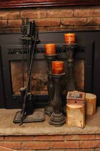 lot 288 image: Set of three tall pedestal metal candle holders, fireplace tools, and incense holder