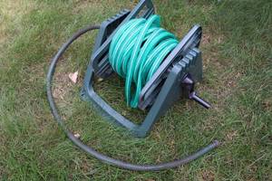 lot 46 image: Hose reel and hose