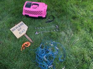 lot 122 image: &nbspSmall Pet kennel, Novel Cat sign, Leash stakes and cables, Pooper scooper