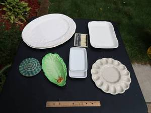 lot 133 image: Turkey Serving platters, Veggie dish, Deviled Egg dish, hot pad, misc. platters, stainless steel mini forks