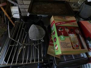 lot 147 image: Nordic Ware Cake Pops baking kit, Nordic Ware Shortbread baking pan, Pamper Chef slicer, Muffin pans, Cookie sheet pans, Baking cooling racks, Roster pan, misc items