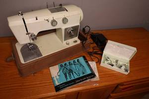 lot 219 image: Wards Signature sewing machine with carrying case and extras