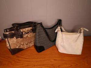 lot 198 image: Three Coach knockoff purses