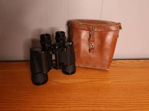 lot 157 image: Holiday binoculars in leather case