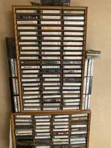 lot 86 image: Collection of vintage cassette tapes and 3 cassette organizers. The majority were taped from original albums