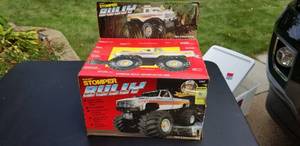 lot 66 image: Un-opened Stomper billy Battery Controlled monster truck,  Muscle car Kits and assorted toys