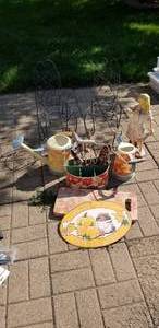 lot 32 image: &nbspMatching Garden tools, Water Pots, Kneeling pad, and Ceramic garden statue, 2-Metal Chair flower pot holders, Harvest ornament