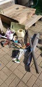 lot 118 image: Garden tools, Garden weed preventing fabric and stakes, Water pots, kneeling pad, 3-X-acto knives, FlowerVeggie naming stakes, Garden gloves
