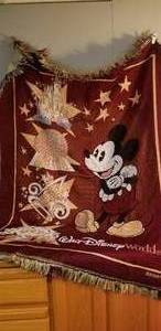 lot 244 image: Disney Mickey blanket, Disney and friends sweater and longsleeve shirt, Mickey Rain ponchos 