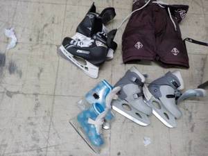 Helmets and Skates in a Covered tot...