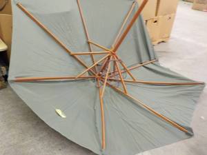 Patio Umbrella, 1 pole broken...