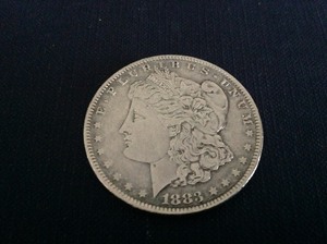 lot 21 image: 1883 O Morgan Dollar