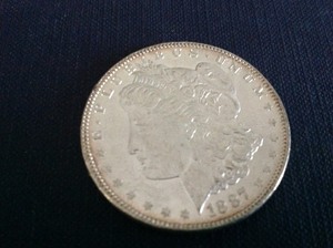 lot 23 image: 1887 P Morgan Dollar
