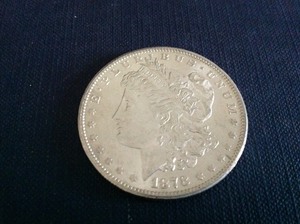 lot 29 image: 1878 S Morgan Dollar