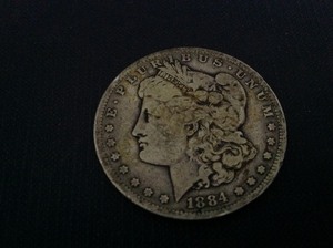 lot 35 image: 1884 S Morgan Dollar