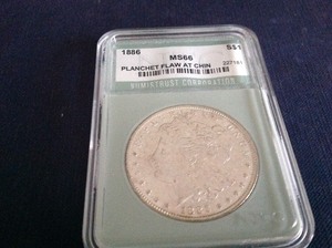 lot 45 image: 1886 Morgan Dollar MS66