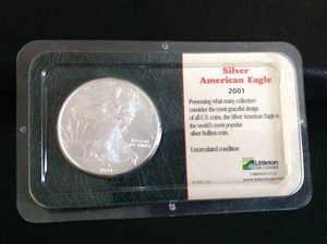 lot 62 image: 2001 Uncirculated 1 oz Liberty Silver Coin