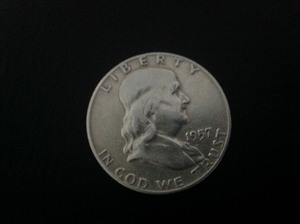 lot 119 image: 1957 D Franklin Half Dollar