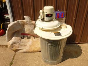 Jet dust collector with bag. 110 volt. Used condition. Tested & works. As shown.