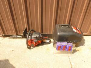 Craftsman 18 gas chainsaw with case. Nearly new. Tested & works. As shown.