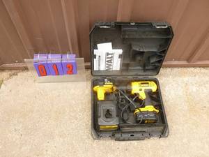 14.4 volt Dewalt drill with 2 batteries & charger. Good used condition. Tested & works. As shown.