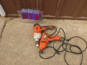 Pair of Black & Decker corded drills. Tested & works. As shown.