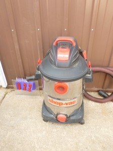 Shop vaccum with stainless tub & 15 hose. Used condition. Tested & works. As shown.