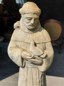 lot 52 image: Cement Saint Holding Bird Statue