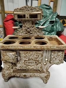 lot 240 image: Antique Embroidered foot stool & Antique Miniature Cast Iron kids Stove