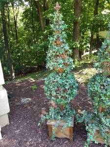 lot 80 image: Enchanting Pair of Faux Topiaries