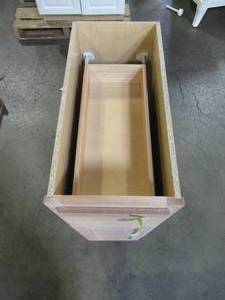 lot 206 image: Hampton Bay Assembled 12x34.5x24 in. Base Kitchen Cabinet in Unfinished Beech KB12-UFDF
