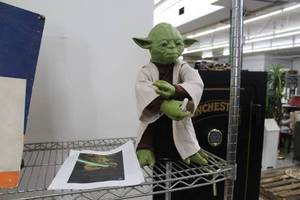 lot 212 image: Star Wars Yoda Talking Doll, Jedi Training Manual