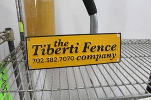 lot 234 image: Metal Sign the Tiberti Fence company