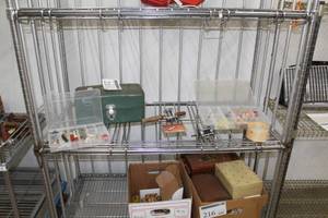 lot 215 image: Fishing Gear, Metal Tackle Box, Fishing Lures, Fishing Tackle, Clear Plastic Organizer Cases with Fishing Tackle, Direct-O-Drive Fishing Reels