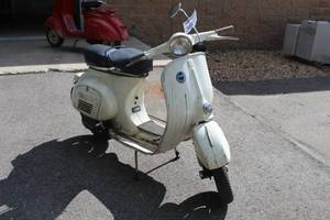 lot 203 image: 1965 Vintage Sears, Roebuck and Co. Cruisaire Vespa Scooter 788.94370