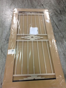 lot 115 image: Unique Home Designs 36 in. x 80 in. Pima Tan Surface Mount Outswing Steel Security Door with Insect Screen not used