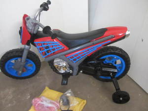 lot 14 image: Spiderman 6V Power Wheels