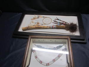 lot 64 image: Necklaces & Coup Stick