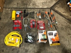 BIN WITH HUSKYDEWALTRIGID ASSORTED TOOLS CUSTOMER RETURNS SEE PICS