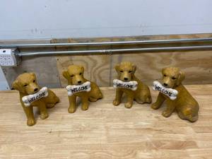lot 83 image: GARDEN TREASURES Lot of Four- 11.75-in H x 7-in W Dog Garden Statues