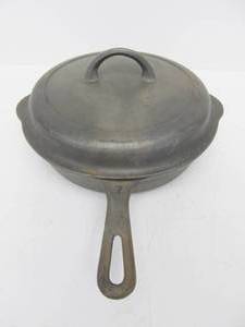 lot 23 image: Vintage GRISWOLD No. 7 Cast Iron 701-C Skillet wMatching Self Basting Lid