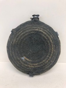 lot 175 image: Authentic Civil War 11-Ring Bullseye Canteen wOriginal Wool Cloth Cover