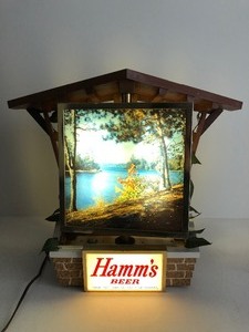 lot 261 image: Awesome Working 1960 HAMMS Lighted Spinning Motion Sign Chalet Clock