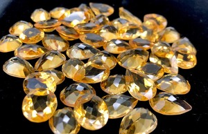 lot 54 image: Large Lot of Genuine Citrine Faceted Gemstones