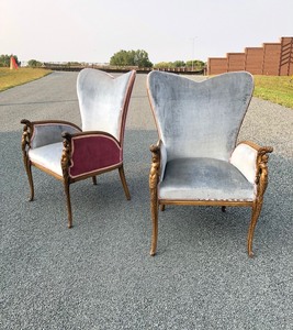 lot 297 image: Matching Pair of Vintage Deco Wingback Armchairs wFigural Nude Carved Arm Supports