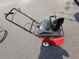 lot 15 image: Yard Machines 5.5 HP 21 Snow Thrower-Turns Over-No Gas To Test