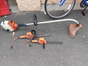 lot 16 image: Stihl Weed Wacker, 2-Black & Decker Electric Hedgers
