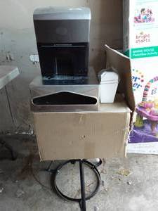 lot 23 image: Case Of Chinese Take Out Boxes, Napkin Dispenser With Key, Paper Shredder, Propane Stand