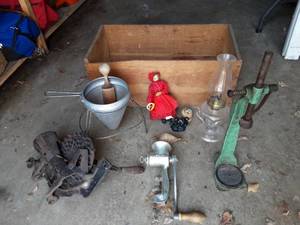 lot 37 image: Old Wood Crate, Corn Sheller, Lantern Oil Lamp, Grinder, Bottle Capper, Misc