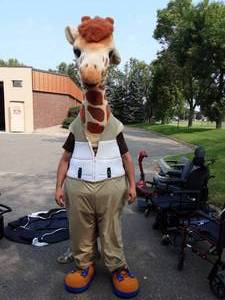 lot 13 image: Geoffrey Giraffe Costume (Toys R Us)(No Shirt) Fits 6 Foot Tall Man
